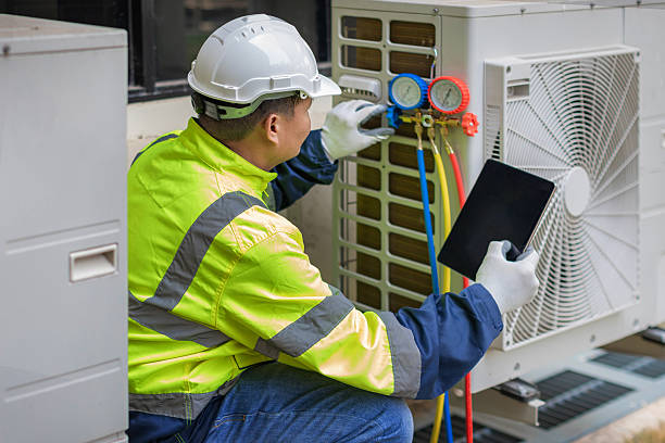 Professional Heat Pump Repair technician working in Capshaw, AL